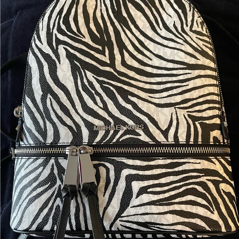 MK Rhea Backpack.. excellent condition..zebra print